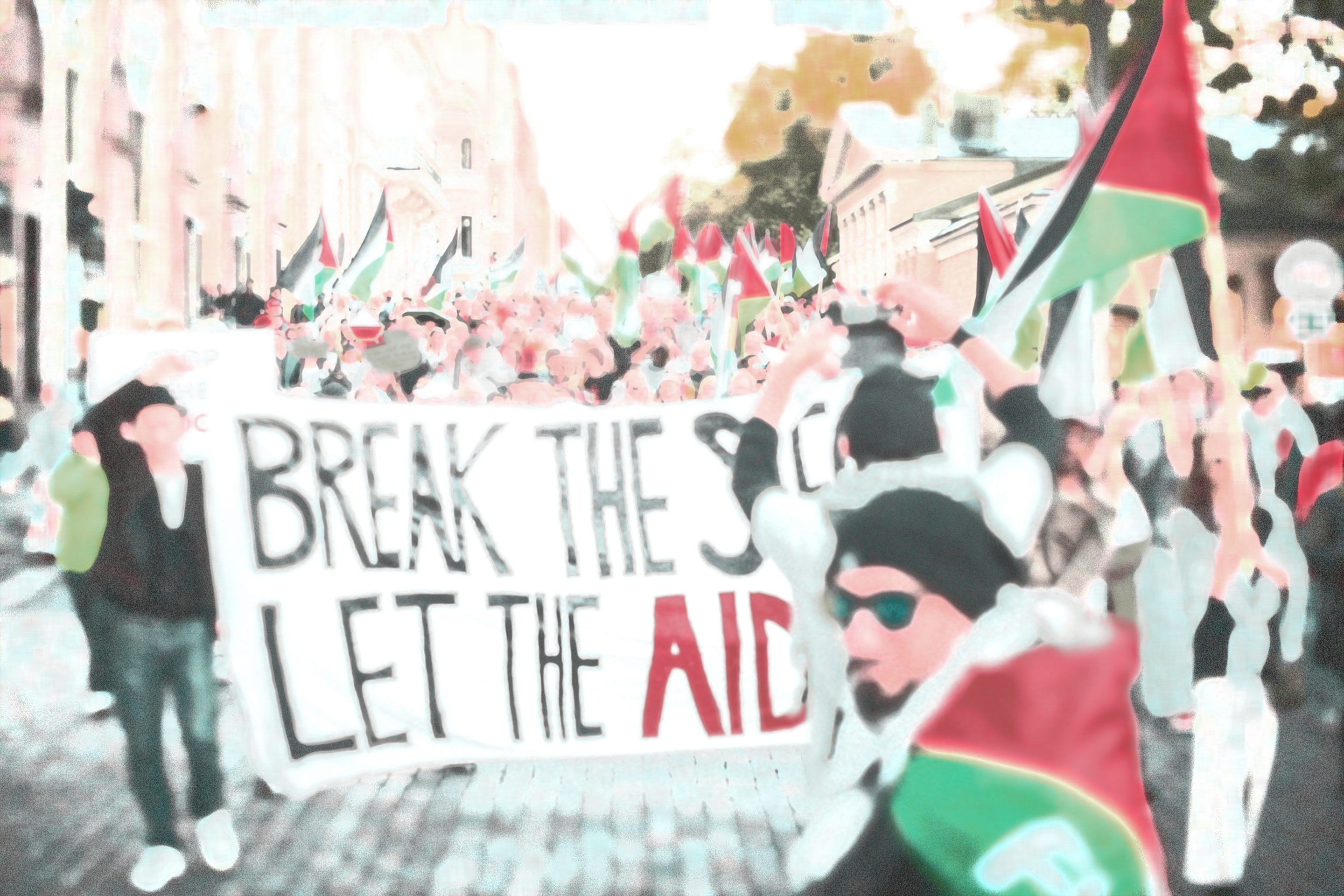 Demonstration, people holding a sign saying "Break the siege, let the aid in"